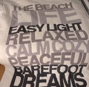 Cozy coastal Barefoot Dreams blanket / throw